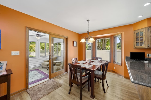 541 Donald St, Hinckley, IL 60520 - dining space with healthy amount of natural light, light wood-style floors, a chandelier, and recessed lighting
