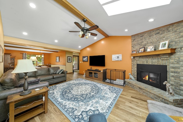541 Donald St, Hinckley, IL 60520 - living area featuring ceiling fan, wood finished floors, a brick fireplace, and recessed lighting
