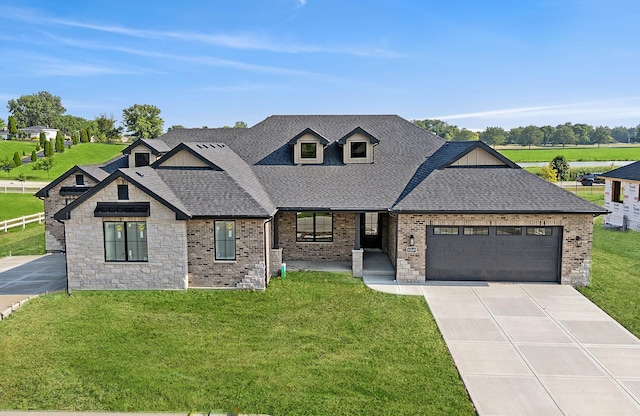11049 Lizmore Ln Unit 40B, Orland Park, IL 60467 - view of front of home featuring a shingled roof, an attached garage, a front lawn, and concrete driveway