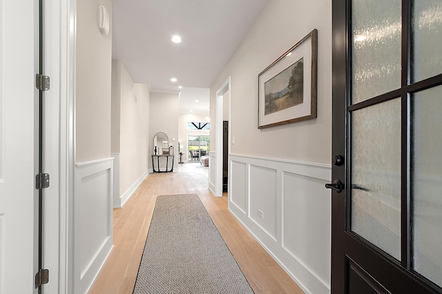 11049 Lizmore Ln Unit 40B, Orland Park, IL 60467 - hallway with light wood-type flooring, a wainscoted wall, and recessed lighting