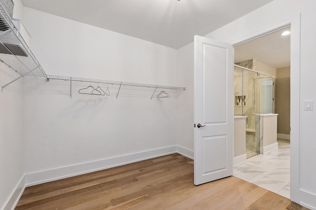 11049 Lizmore Ln Unit 40B, Orland Park, IL 60467 - spacious closet featuring light wood-type flooring