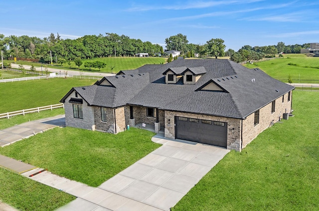 11049 Lizmore Ln Unit 40B, Orland Park, IL 60467 - view of front of house with driveway, a shingled roof, brick siding, and an attached garage