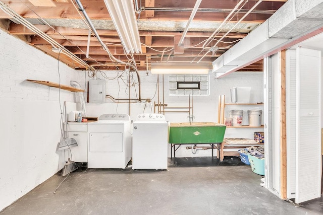 3052 W 100th St, Evergreen Park, IL 60805 - unfinished basement featuring electric panel and washer and clothes dryer