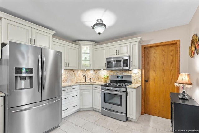 8011 Lawler Ave, Burbank, IL 60459 - kitchen with appliances with stainless steel finishes, tasteful backsplash, glass insert cabinets, light stone countertops, and light tile patterned floors