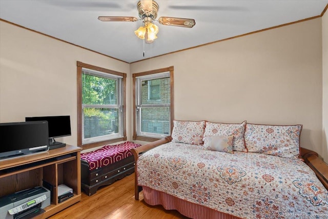 8011 Lawler Ave, Burbank, IL 60459 - bedroom featuring light wood-style floors, crown molding, and a ceiling fan