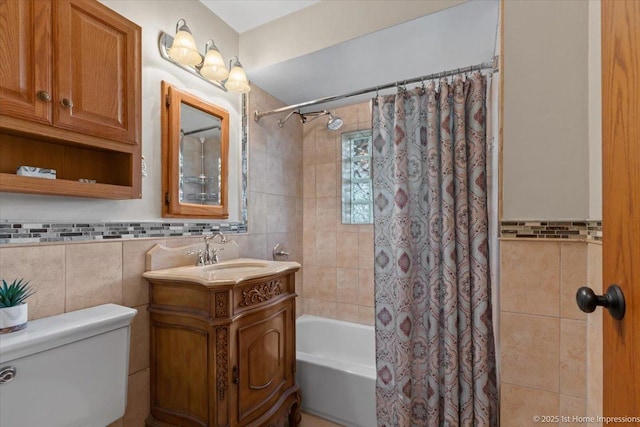 8011 Lawler Ave, Burbank, IL 60459 - full bathroom featuring tile walls, shower / tub combo with curtain, and vanity