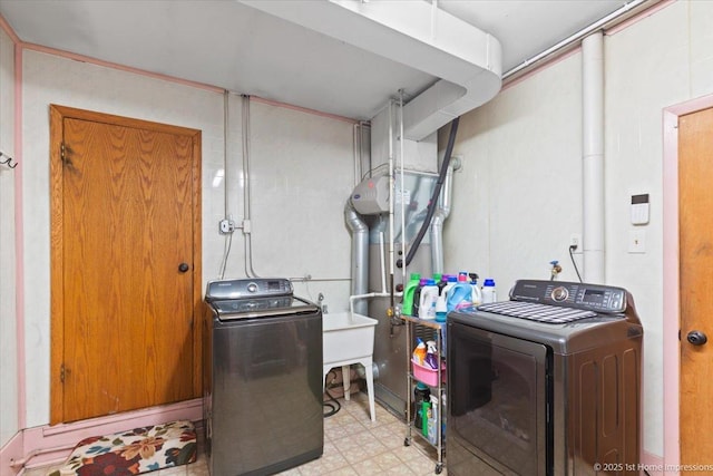 8011 Lawler Ave, Burbank, IL 60459 - laundry area featuring light flooring and washing machine and clothes dryer