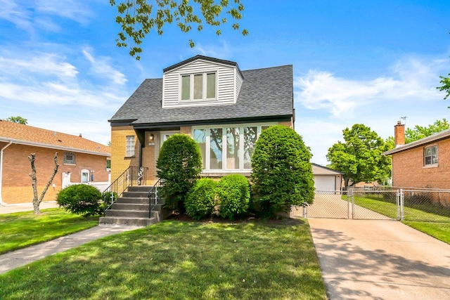 10817 S Kenneth Ave, Oak Lawn, IL 60453 - view of front of house featuring a shingled roof, an outbuilding, a detached garage, and brick siding
