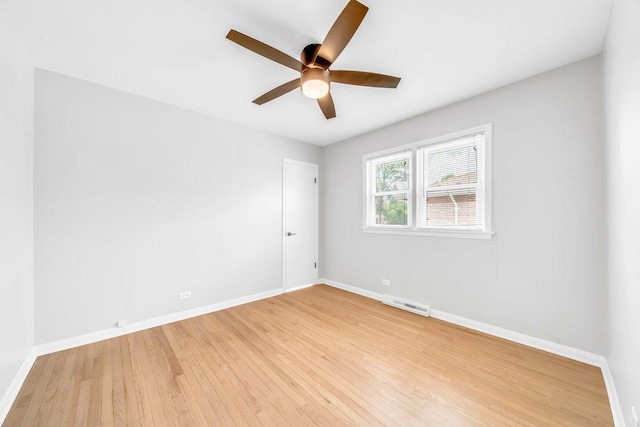10817 S Kenneth Ave, Oak Lawn, IL 60453 - unfurnished room with ceiling fan and light wood-type flooring