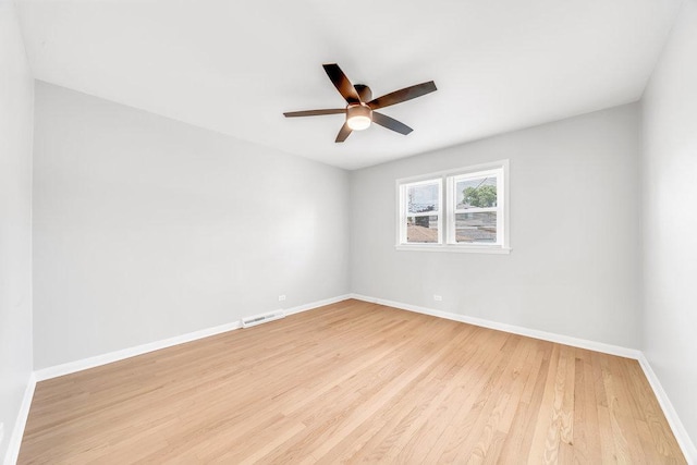 10817 S Kenneth Ave, Oak Lawn, IL 60453 - empty room with a ceiling fan and light wood-type flooring