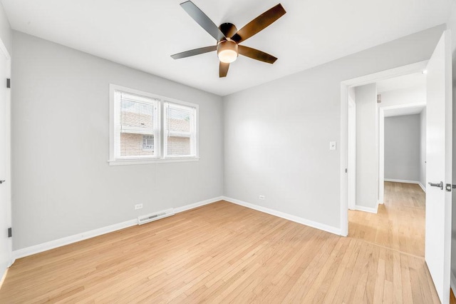 10817 S Kenneth Ave, Oak Lawn, IL 60453 - unfurnished room with light wood finished floors and ceiling fan
