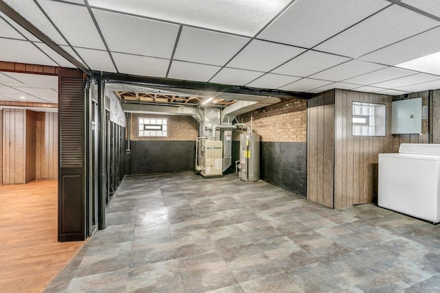 10817 S Kenneth Ave, Oak Lawn, IL 60453 - basement featuring washer / dryer, water heater, electric panel, heating unit, and wooden walls