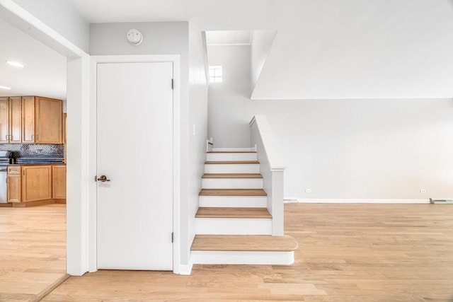 10817 S Kenneth Ave, Oak Lawn, IL 60453 - staircase with wood finished floors and recessed lighting