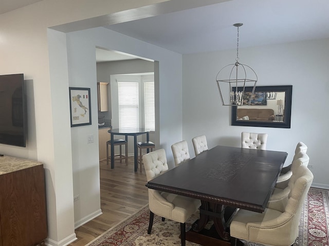 21024 W Walnut Ln, Plainfield, IL 60544 - dining room with wood finished floors and a chandelier