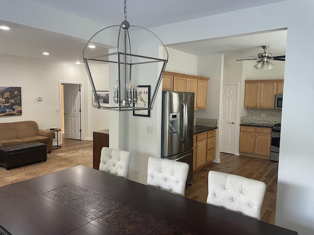 21024 W Walnut Ln, Plainfield, IL 60544 - dining room with a chandelier, dark wood-style floors, recessed lighting, and a ceiling fan