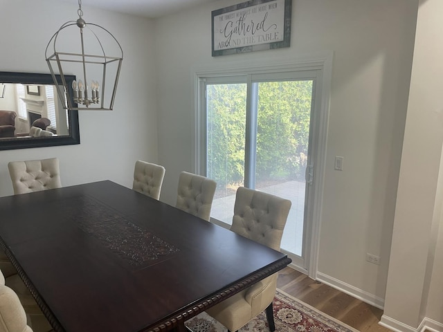 21024 W Walnut Ln, Plainfield, IL 60544 - dining room with a chandelier and dark wood-type flooring