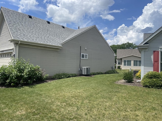 21024 W Walnut Ln, Plainfield, IL 60544 - view of side of property featuring a shingled roof and a yard