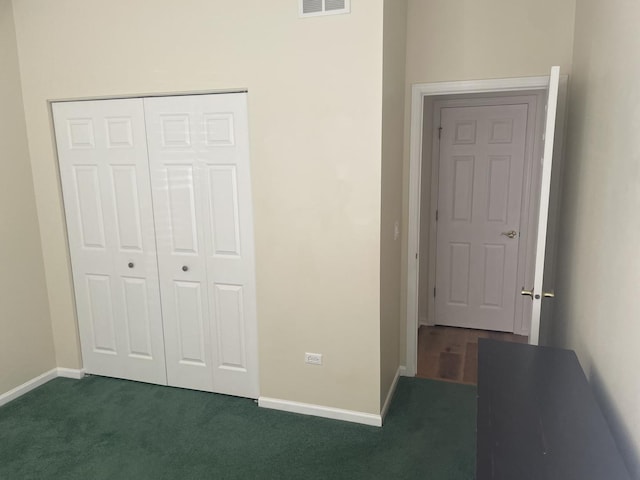 21024 W Walnut Ln, Plainfield, IL 60544 - unfurnished bedroom with dark carpet and a closet
