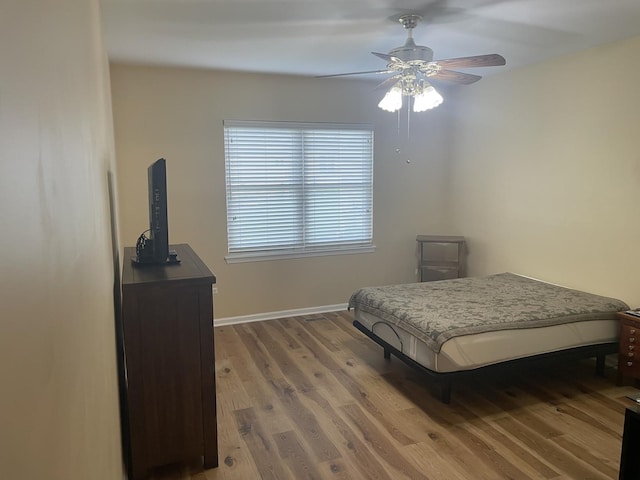 21024 W Walnut Ln, Plainfield, IL 60544 - bedroom with light wood-type flooring and a ceiling fan