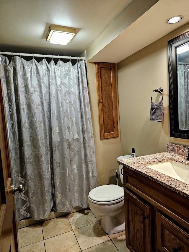 129 S Commonwealth Ave, Elgin, IL 60123 - full bath featuring vanity and tile patterned flooring