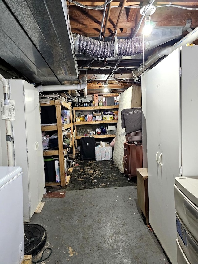 129 S Commonwealth Ave, Elgin, IL 60123 - unfinished basement featuring refrigerator