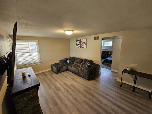 129 S Commonwealth Ave, Elgin, IL 60123 - living area featuring baseboards and wood finished floors