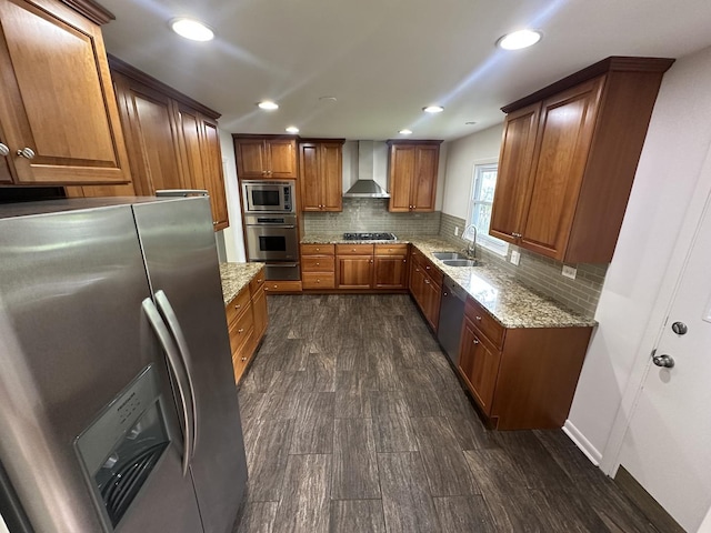 1028 Castlewood Ln, Deerfield, IL 60015 - kitchen featuring stainless steel appliances, wall chimney range hood, a warming drawer, brown cabinetry, and light stone countertops