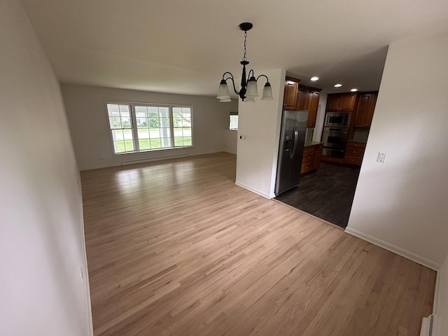 1028 Castlewood Ln, Deerfield, IL 60015 - unfurnished dining area with a chandelier, dark wood-style floors, and recessed lighting