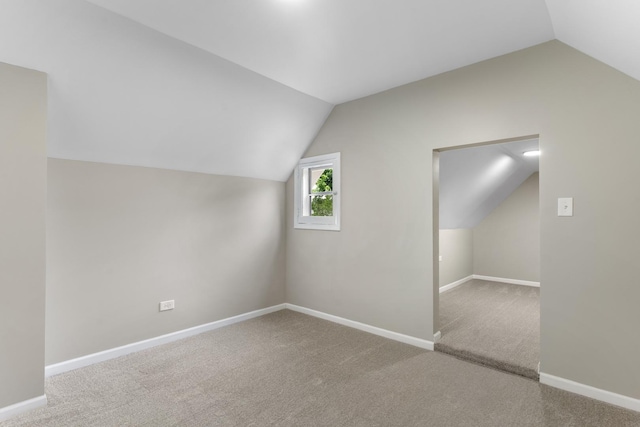 444 Villa St, Elgin, IL 60120 - additional living space with lofted ceiling and carpet flooring