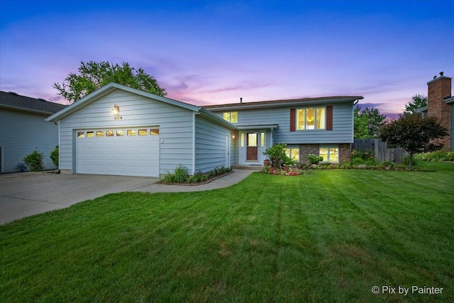 404 Kensington Dr, Mchenry, IL 60050 - tri-level home with an attached garage and concrete driveway
