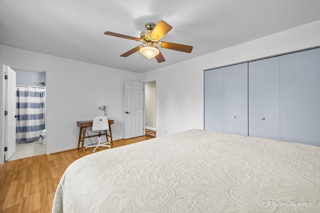 404 Kensington Dr, Mchenry, IL 60050 - bedroom with light wood-style flooring, a closet, ceiling fan, and connected bathroom