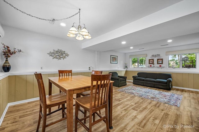 404 Kensington Dr, Mchenry, IL 60050 - dining area featuring light wood finished floors, wainscoting, recessed lighting, a chandelier, and wooden walls