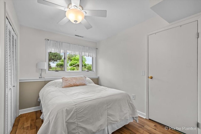 404 Kensington Dr, Mchenry, IL 60050 - bedroom featuring a closet, wood finished floors, and a ceiling fan