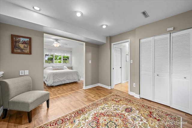 404 Kensington Dr, Mchenry, IL 60050 - bedroom featuring light wood-style floors, a closet, and a ceiling fan