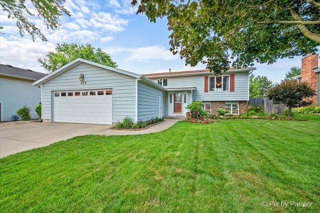 404 Kensington Dr, Mchenry, IL 60050 - split level home featuring a garage and concrete driveway