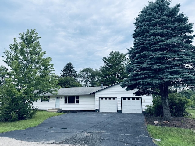 5907 Kirkwood Dr, Rockford, IL 61109 - single story home with a garage and driveway