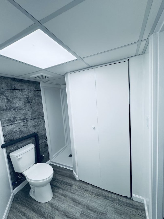 5907 Kirkwood Dr, Rockford, IL 61109 - full bathroom with a stall shower and wood finished floors