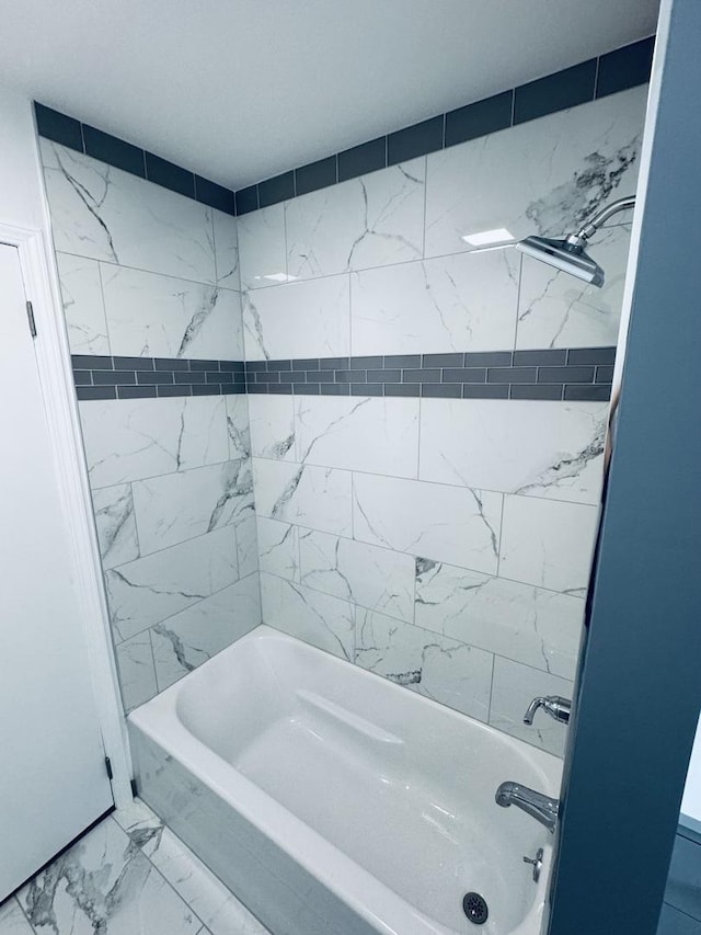 5907 Kirkwood Dr, Rockford, IL 61109 - bathroom with shower / bathtub combination and marble finish flooring