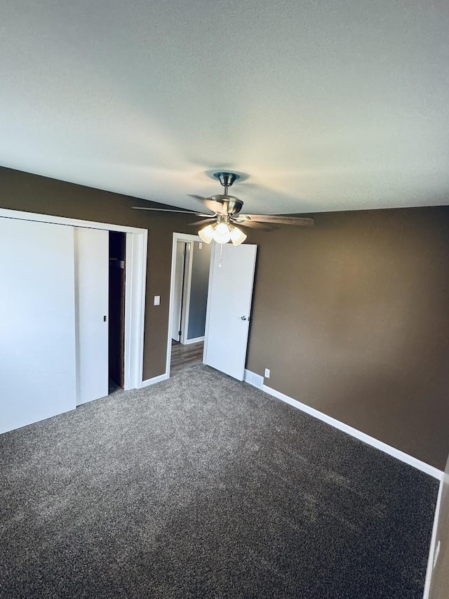 5907 Kirkwood Dr, Rockford, IL 61109 - unfurnished bedroom with carpet flooring, a closet, and ceiling fan