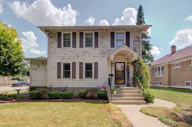 900 Mason Ave, Joliet, IL 60435 - colonial-style house featuring a front lawn