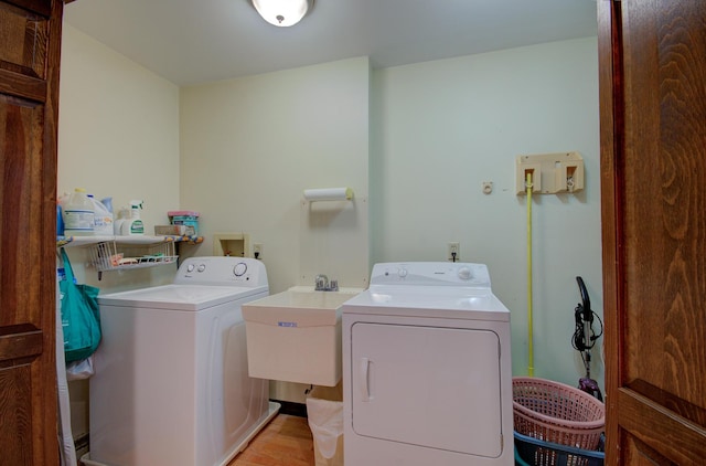 900 Mason Ave, Joliet, IL 60435 - washroom with washing machine and clothes dryer and light wood-style flooring