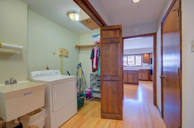 900 Mason Ave, Joliet, IL 60435 - laundry room featuring washer / dryer and light wood-style flooring