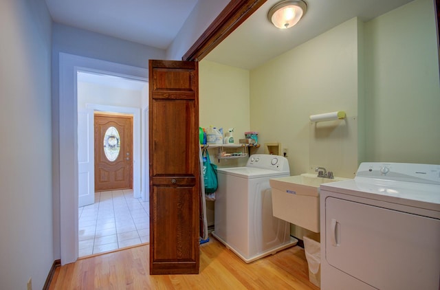900 Mason Ave, Joliet, IL 60435 - laundry room featuring washing machine and dryer and light wood finished floors
