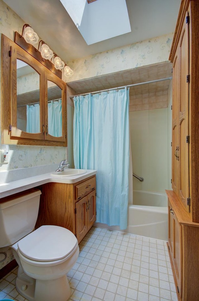 900 Mason Ave, Joliet, IL 60435 - full bath with a skylight, vanity, shower / tub combo, and tile patterned flooring