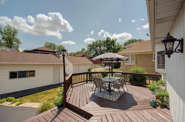 900 Mason Ave, Joliet, IL 60435 - wooden deck featuring outdoor dining space and a residential view