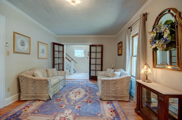 900 Mason Ave, Joliet, IL 60435 - living room with wood finished floors, stairs, crown molding, and a textured ceiling
