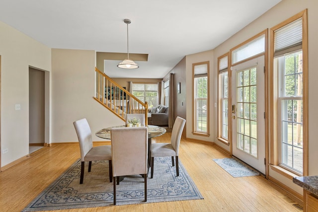 16260 W Mohawk Ct, Lockport, IL 60441 - dining area featuring light wood-type flooring and stairs