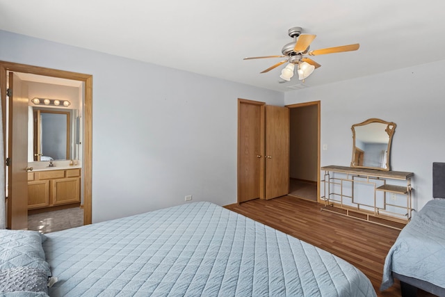 16260 W Mohawk Ct, Lockport, IL 60441 - bedroom with wood finished floors, ensuite bathroom, and a ceiling fan