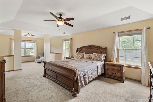 16260 W Mohawk Ct, Lockport, IL 60441 - bedroom with light carpet, a tray ceiling, and ceiling fan