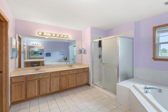 16260 W Mohawk Ct, Lockport, IL 60441 - bathroom with a bath, a stall shower, tile patterned flooring, and double vanity